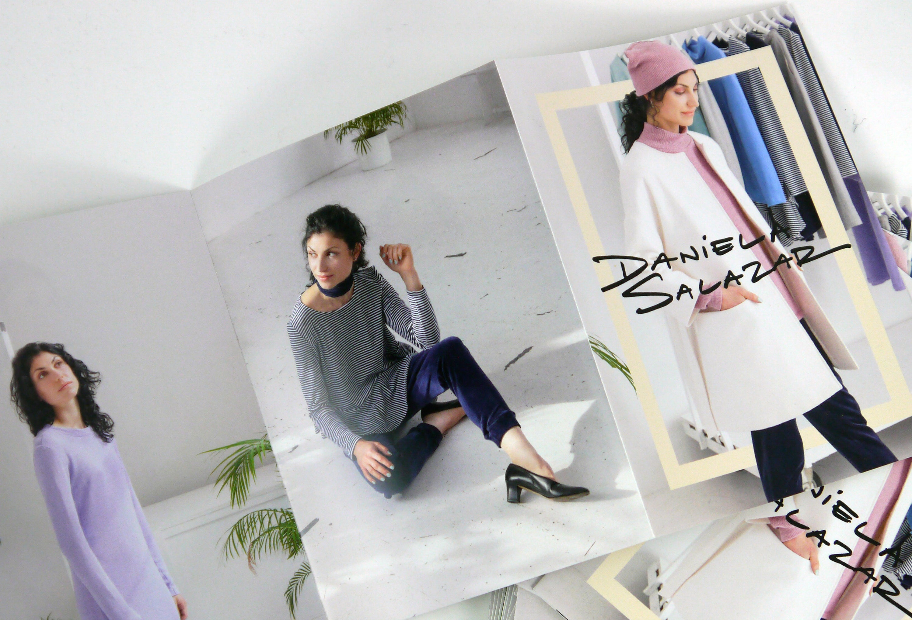 Two fashion flyers featuring women in stylish outfits from the winter 2016 collection with 'Daniela Salazar' branding.